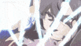 a close up of a person 's face with a sword coming out of his mouth .