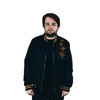a man with a beard wearing a black and gold jacket