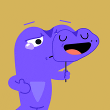 a cartoon of a frog holding a mask with a sad face on it