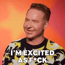 a man wearing a yellow and black sweater says " i 'm excited as f * ck "