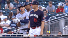 a baseball game between minnesota and cleveland is going on