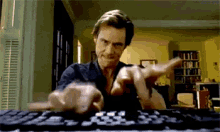 jim carrey bruce almighty typing focused working