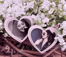 two heart shaped picture frames with two women on them are surrounded by white flowers
