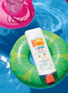 a tube of avon skin soft bug guard sits on an inflatable ring