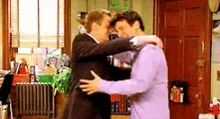Barney And Ted GIF - Bromance Hug How I Met Your Mother GIFs