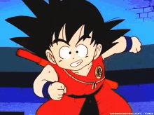 a cartoon of a boy with a red shirt that says goku