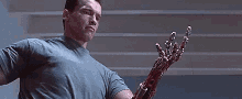 Terminator Arnold Schwarzenegger GIF - Terminator Arnold Schwarzenegger Arm GIFs