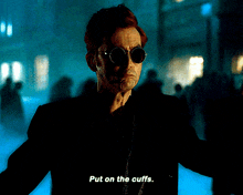 Crowley Good Omens Crowley Put On The Cuffs GIF - Crowley Good Omens Crowley Good Omens GIFs