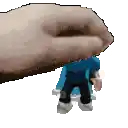 a pixel art of a hand holding a small toy man .