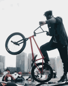 Posing With A Bike Nigel Sylvester GIF - Posing With A Bike Nigel Sylvester Modeling GIFs