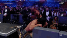 a wrestling match is being shown live on a wrestling network