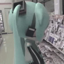 a mannequin wearing headphones is standing in front of a magazine shelf