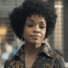 a close up of a woman 's face with the word max on the bottom right