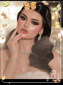 a woman with butterflies in her hair is surrounded by butterflies