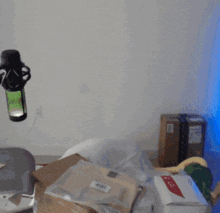 a blurry picture of a person sitting in a chair with a bottle of beer