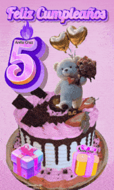 a birthday cake with a teddy bear holding a bouquet of flowers and the number 5 on top