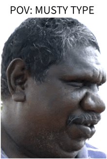 a close up of a man 's face with the words pov : musty type below it