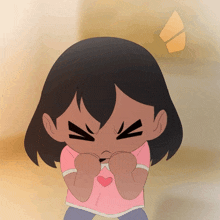 a girl in a pink shirt with a heart on it is making a funny face