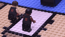 a lego figure with the number 15 on it