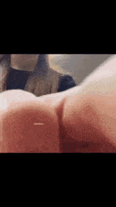 a close up of a woman 's butt with a blurred background
