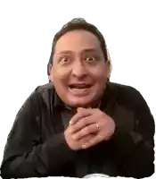 a man in a black shirt is making a funny face