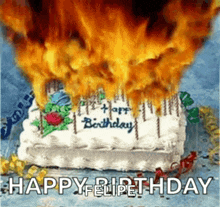 a birthday cake with flames coming out of it .