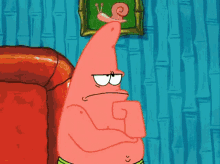 a cartoon character with a snail on his head is sitting on a couch