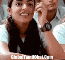 a group of people are sitting in a classroom with the website globaltamilchat.com at the bottom