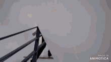 a woman is walking down a set of wooden stairs made in animatica
