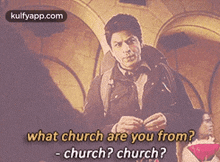 a man is standing in front of a building and asking what church are you from - church ? church ?