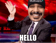 a man wearing a hat that says multivers on it says hello