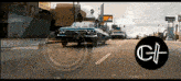a car is driving down a street next to a sign that says ' express ' on it