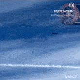 a picture of a plane flying in the sky with the caption puffy gatorade