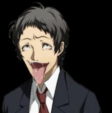 a man in a suit and tie with his tongue sticking out