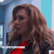 a close up of a woman 's face with the words patylapatrona on the bottom