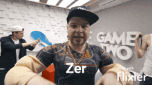 a man with the name zer on his shirt is standing in front of a game two sign