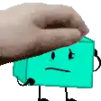 a hand is putting a donut on top of a blue block with arms and legs .
