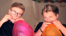 A Helium Balloon Popping In Marcus Butler'S Face GIF - Tyler Oakley Marcus Butler Balloon GIFs