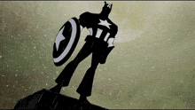a silhouette of captain america holding a shield in the rain