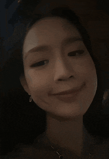 a close up of a woman making a funny face with her mouth open