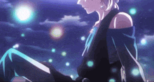 a woman in a blue dress is sitting in front of a purple sky