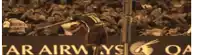 a soccer player stands in front of a sign that says " ar airways "