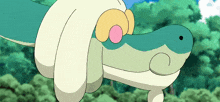 a close up of a cartoon snake with a pink bubble on its head .