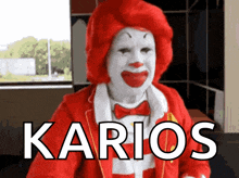 a mcdonald 's clown with red hair and white face has the word karios on the bottom