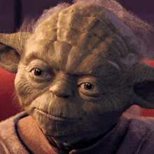a close up of yoda 's face in a star wars movie