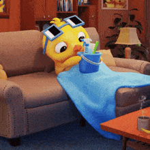 a cartoon duck is laying on a couch with a blue blanket and a bucket of cleaning supplies
