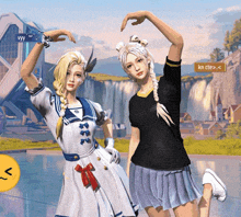 two girls making a heart shape with their hands in front of a sign that says vyy
