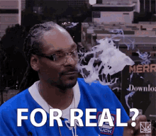 snoop dogg is wearing glasses and smoking a cigarette while asking for real
