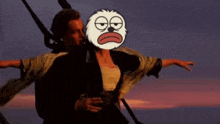 a man is carrying a woman on his back in a titanic scene .