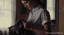 Smelling A Piece Of Clothing Kya GIF - Smelling A Piece Of Clothing Kya Daisy Edgar Jones GIFs